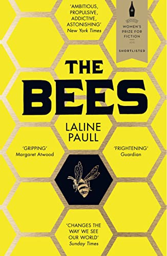 Cover image: The Bees by Laline Paull. The background is yellow with a copper honeycomb pattern on top. The title is in the upper middle with the author's name below. The honeycomb section beneath the title is filled in black, with an image of a bee in the centre.